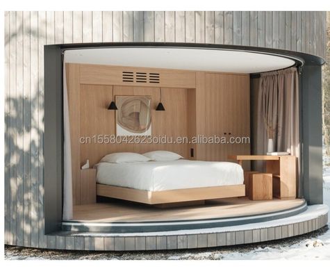 Casa in contenitore con struttura in acciaio leggero con un bagno, una cucina e finestre in lega di alluminio