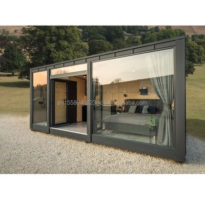 Moderno stile di design colore personalizzato in legno Prefabbricato Container House Acciaio pannello sandwich Hotel servizi igienici per esterni