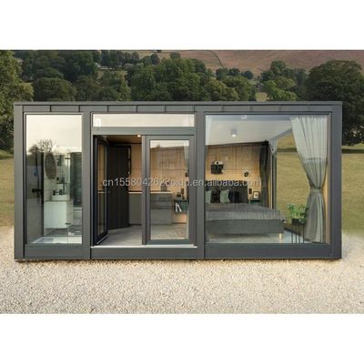 Moderno stile di design colore personalizzato in legno Prefabbricato Container House Acciaio pannello sandwich Hotel servizi igienici per esterni
