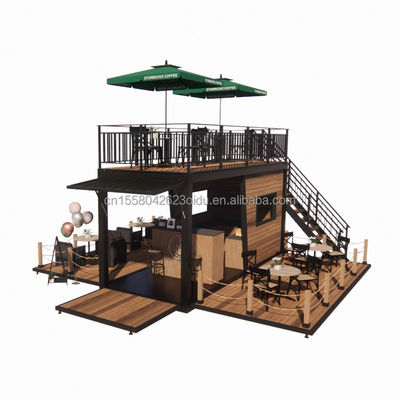 Ristorante mobile prefabbricato con terrazzo in acciaio e pareti di pannelli sandwich ondulati