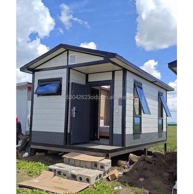 Moderna casa mobile modulare con porta a pannello sandwich con contenitore di imballaggio piatto prefabbricato da 20 piedi nell'Unione europea