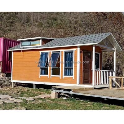 Moderna casa mobile modulare con porta a pannello sandwich con contenitore di imballaggio piatto prefabbricato da 20 piedi nell'Unione europea