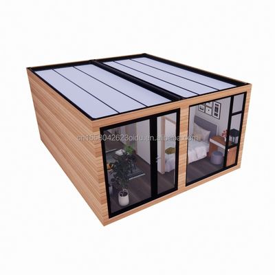 Prefabbricato in legno vetro Casa a luce solare Casa contenitore con colore personalizzato e muro 50/75/100mm pannello sandwich ondulato